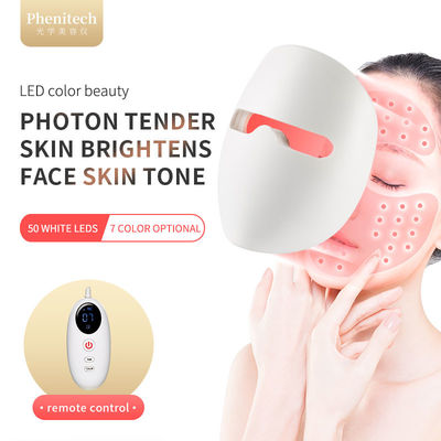 Masque protecteur infrarouge tenu dans la main de thérapie de photo de lumière de 7 couleurs LED
